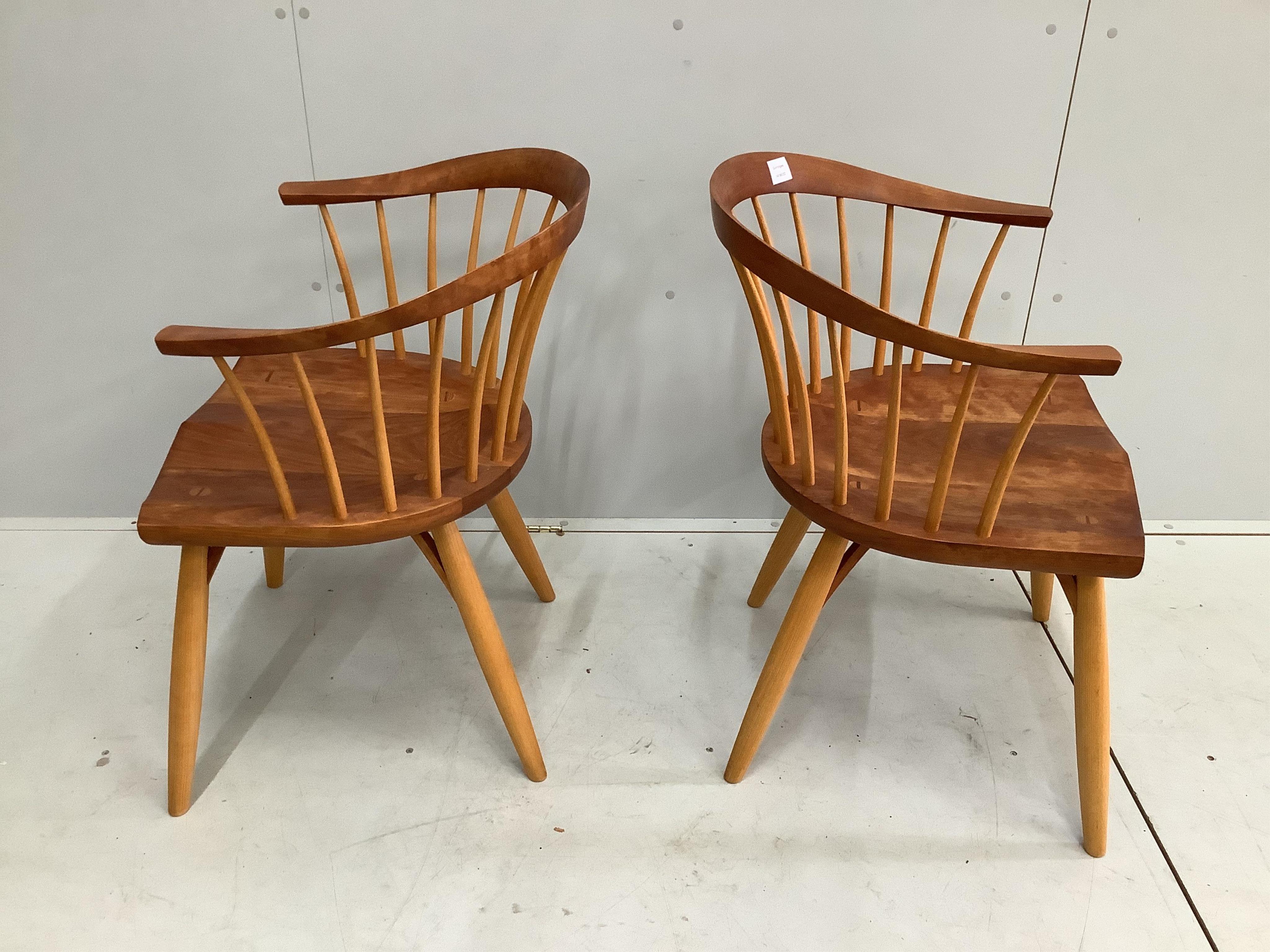 A pair of Thomas Moser cherrywood 'Newport' armchairs, width 56cm, depth 47cm, height 80cm. Condition - good